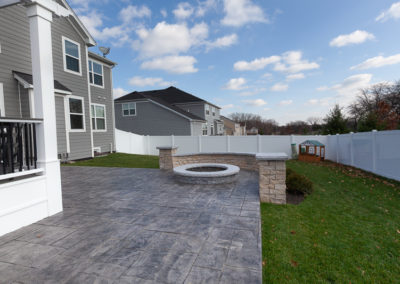 back deck pergola stamped concrete patio fire pit outdoor tv glen ellyn illinois