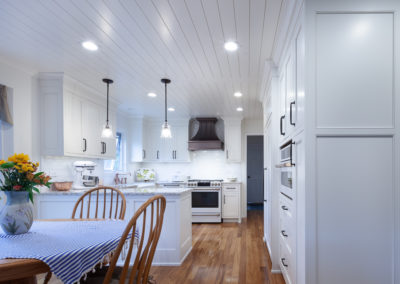 farmhouse kitchen remodel laundry room herringbone shiplap ceiling vintage range white kitchen granite subway backsplash