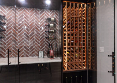 basement bar and wine room storage brick backsplash hyland homes clarendon hills, illinois